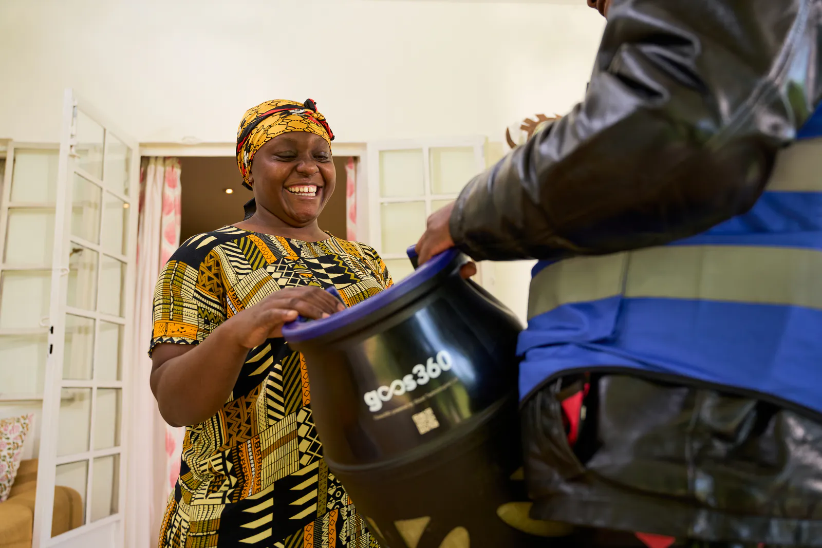 woman receiving gas bottle